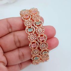 Pair of rose gold pink and mint green american diamond CZ Bangles.  Size available 2.6 & 2.8 Rose Gold Base Filled with American Diamond Stone. Rose Gold Bangles, Mint Jewelry, Ear Chain, Bangles Set, Rose Gold Bangle, The Bangles, Gold Plated Bangles, Head Chain, Pakistani Jewelry