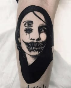 a person with a creepy face and words on their arm that says, i'm afraid