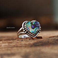 Abalone Shell Ring, Heart Shape Ring, 925 Sterling Silver Ring, Unique Ring, Handmade Ring, Silver Artisan Ring, Wedding, Gift For Her Metal: 925 Sterling Silver Gemstone : Abalone Shell  Stone Color : Multi Stone Shape : Heart Stone Setting: Bezel Benefits of wearing Rainbow moonstone:- Rainbow moonstone is thought to bring balance, harmony and hope while enhancing creativity, compassion, endurance and inner confidence. Rainbow moonstone is believed to help strengthen intuition and psychic perc Sterling Silver Inlay Jewelry For Anniversary, Sterling Silver Jewelry With Inlay For Anniversary, Anniversary Sterling Silver Jewelry With Inlay, Elegant Handmade Heart-shaped Rings, Sterling Silver Inlay Ring For Anniversary, Unique Sterling Silver Heart Ring, Handmade Silver Heart-shaped Rings, Handmade Silver Heart Rings, Handmade Silver Heart Ring For Anniversary