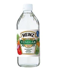 a bottle of vinegar water on a white background