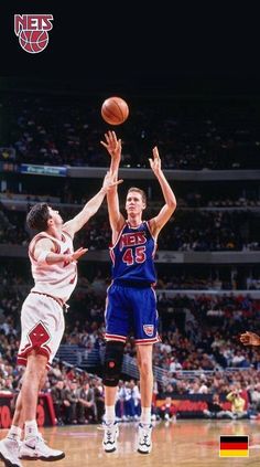 an image of a basketball game being played in the middle of the court with people watching