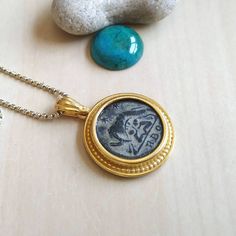 "Genuine Ancient Roman Coin Pendant Necklace Vintage Gold Jewelry Roman Art ---------------------------------------------------- A one of a kind storytelling Roman Coin pendant featuring a real antique Roman bronze coin - It is approximately 1700 years old! A precious find for history jewelry and vintage jewelry connoisseurs! ♦ Excellent quality coin, details are clear and it has a beautiful light grey patina. You will receive the exact coin in photos. ♦Including a certificate of Authenticity!♦ Antique Gold Coin Pendant Jewelry For Collectibles, Antique Gold Jewelry With Coin Pendant For Collectors, Ancient Style Engraved Yellow Gold Necklaces, Handmade Antique Coin Necklace With Round Pendant, Ancient Style Coin Necklace With Round Pendant, Ancient Engraved Round Pendant Necklace, Byzantine Coin Jewelry For Ceremonial Occasions, Byzantine Style Coin Jewelry For Ceremonial Use, Collectible Ancient Style Yellow Gold Jewelry