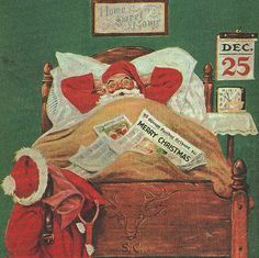 an old fashioned christmas card with santa in bed