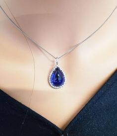 15.43 Carat Tanzanite and Diamond Pendant Necklace in 18 Karat White Gold For Sale at 1stDibs Timeless Teardrop Drop Necklace For Formal Occasions, Timeless Teardrop Pendant Drop Necklace For Formal Occasions, Fine Jewelry Pear-shaped Drop Necklace For Formal Events, Formal Teardrop Pendant Drop Necklace, Formal Teardrop Drop Necklace With Diamond Cut, Luxury Silver Pear-shaped Drop Necklace, Luxury Tanzanite Pear-shaped Jewelry, Luxury Pear-shaped Tanzanite Jewelry, Formal Sapphire Teardrop Pendant Necklace