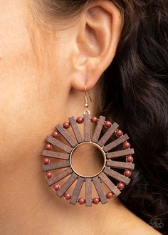 Separated by dainty brown beads, a series of wooden rectangular frames fan out from a golden ringed center for an earthy flair. Earring attaches to a standard fishhook fitting.

 Sold as one pair of earrings. Wooden Bead Earrings, Amazing Earrings, Trendy Fringe, Pink Jewels, Brown Earrings, Solar Flare, 25 21, Paparazzi Accessories, Paparazzi Jewelry