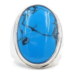 The center stone in this ring is a 24 mm by 15 mm polished cabochon of imitation turquoise that looks and feels just like genuine turquoise. Overall the ring is about one inch top to bottom and sits surprisingly low on your finger. Set in highly polished rhodium plated brass giving the ring a very modern look. Simulate Turquoise Jewelry Rings, Womens Activewear Tops, Turquoise Fashion, Garden Jewelry, Single Stone, Real Stone, One Inch, Turquoise Gemstone