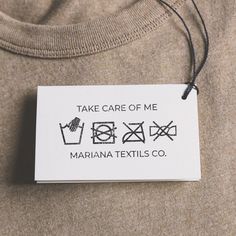 there is a tag that says take care of me on the back of a t - shirt