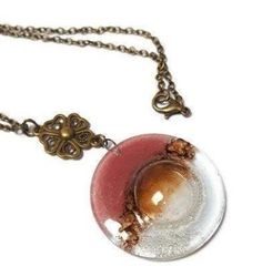 Look at that amazing bubble!! Pink, brown and clear necklace. One of a kind. The melted round glass bead is 1.25'' in diameter. This was a new color for the season. The antique bronze looking chain is aprox 24 inches long. The necklace (including the pendant) is aprox 26.5'' long All the jewelry is handmade of recycled glass. This is real glass that comes from windows and other more traditional sources. We use clean, clear, flat glass. The glass is cut and assembled, then fired in a kiln to fuse Clear Necklace, Fused Glass Necklace, Eco Friendly Jewelry, Long Pendant, Glass Necklace, Recycled Glass, Round Glass, Fused Glass, Antique Bronze