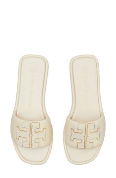 A sleek leather slide accented by Tory's signature double-T logo is ready to upgrade your warm-weather style. Leather upper and lining/rubber sole Imported Shoe Ideas For Women, Tory Burch Slides, Spring Shoes Women, Shoes For School, Pretty Sandals, Pretty Shoes Sneakers, Shoe Ideas, Tory Burch Sandals, Girly Shoes