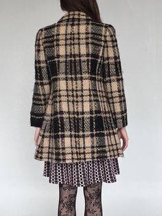 Vintage Miss Chloe brown and cream plaid jacket with black geometric buttons and double pockets. Fully lined and ultra soft. In excellent vintage shape.MEASUREMENTS (in inches)36 in bust 34 in waist 42 in hips 32 in length MATERIALS Wool blendHave a question? Email us All items are FINAL SALE. Vintage pieces are pre-loved and may come with minor flaws, condition will be noted in description. For questions or concerns, please Email us at hello@shopbanshee.com. If purchasing through Meta all polic Beige Long Sleeve Tweed Outerwear, Beige Tweed Long Sleeve Outerwear, Beige Long Sleeve Houndstooth Outerwear, Beige Houndstooth Long Sleeve Outerwear, Chic Plaid Long Sleeve Tweed Jacket, Fitted Beige Houndstooth Outerwear, Chic Plaid Outerwear With Buttons, Chic Plaid Tweed Jacket With Long Sleeves, Chic Plaid Single Breasted Outerwear