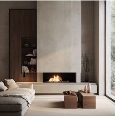 a modern living room with a fireplace and large windows