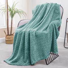 a blanket that is on top of a chair