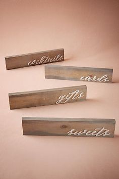 three wooden blocks with words written on them