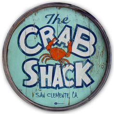 the crab shack sign has an arrow pointing to it