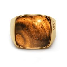 Stainless Steel Ring with Gold Plating.The Nialaya Gentlemen’s Cocktail Ring is designed with a contemporary style. The focal point of the ring is the brilliant tiger eye which sits in the center of its gold-plated band.Please note that all our pieces are crafted by hand and one-of-a-kind, and may therefore vary slightly in size, shape, and color. Avoid contact with hairspray, perfume, water, bleaches and lotions. Avoid humidity, heat and overexposure to sun. Gently wipe you Nialaya jewelry with Tiger Eye Rings For Men, Mens Gold Signet Rings, Cats Eye Ring, Green Tiger Eye, Brown Tiger, Brown Tiger Eye, Jewelry Wardrobe, Signet Ring Men, Gold Signet Ring