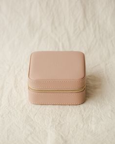 Co-designed with our community to fulfill every jewelry lover’s dream, our signature jewelry case is the organization solution you need for your dainty pieces, both at home and away. Crafted in sturdy, plant-fiber vegan leather (no polyurethane here!) for a luxe leather feel without the leather implications, in two soothing hues: rose petal and soft sage. This case has it all: – Anti-tarnish suedette interior – 2 removable cards for dainty earrings—use them to curate ear stacks! – 6 slots for ri Elegant Rectangular Jewelry Storage For Daily Use, Elegant Rectangular Jewelry Storage For Personal Use, Ear Stacks, Ear Stack, Plant Fibres, Organization Solutions, Signature Jewelry, Co Design, Dainty Earrings