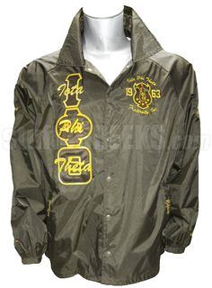 a green jacket with yellow writing on it