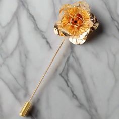 This exquisite lapel pin, shaped like a gold-colored rose flower, adds a touch of elegance and romance to any outfit. Its refined design and luxurious color make it a versatile accessory, perfect for both formal and special occasions. Dress Shirts: White Dress Shirt: A classic choice that provides a clean backdrop, allowing the gold rose pin to shine prominently. Light Pink Dress Shirt: Adds a subtle, complementary tone that enhances the pin’s romantic design. Pale Blue Dress Shirt: Offers a sof Pale Blue Dress, Ivory Suit, Pale Blue Dresses, Blue Dress Shirt, Flower Lapel, Flower Lapel Pin, White Dress Shirt, Light Pink Dress, Red Peach