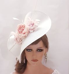 Large White  Hat Fascinator with long Quill Feather and  Shade of light PINK Flowers, perfect for Mother of Bride or Goom, Royal Ascot, Kentucky Derby, Weddings Goodwood revival, Christening, Ascot or any special occasion. Gorgeous White and  Light shade of pink floral straw weave Hat fascinator long quill feather and  Silk flowers This can be made with feathers or without feathers ( Without long quill feather and small feathers or just with the samall feathers or just with long quill feather. P Groom Hat, Race Wedding, Pink Fascinator, Ascot Hats, Hat Fascinator, Goodwood Revival, Hat Base, Light Pink Flowers, Elegant Hats