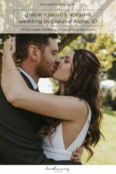 a man and woman kissing in front of a tree with the caption grace + jacob's elegant wedding in court d'alene, id