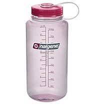 a pink water bottle with a measuring cup on top