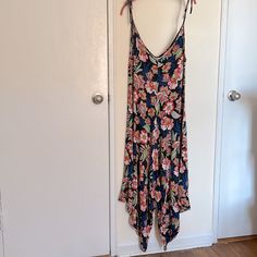 Rand New Never Worn One Size Fits All Asymmetrical Hem Wide Leg Loose Fit Strechy Boho Style Multicolor Flower Pattern Spaghetti Adjustable Straps Poly Elastane Mixed Very Comfortable For Summer Sleeveless Rayon Jumpsuits And Rompers For Beach, Sleeveless Rayon Jumpsuit For The Beach, Sleeveless Rayon Jumpsuit For Beach, Sleeveless Floral Print Jumpsuits And Rompers For Beach, Sleeveless Rayon Jumpsuits And Rompers For Spring, Summer Beach Rayon Jumpsuits And Rompers, Summer Beach Jumpsuits And Rompers In Rayon, Blue Tropical Print Jumpsuits And Rompers For Beach, Floral Print Jumpsuits And Rompers With Spaghetti Straps