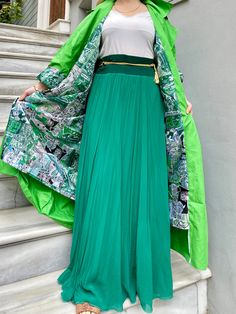 ⚜ Experience the elegance and comfort of the Emerald Green Long Chiffon Skirt, a versatile addition to your summer wardrobe that promises to enhance your style effortlessly. This exquisite skirt will offer a harmonious blend of beauty and practicality, ensuring you remain both fashionable and at ease throughout the day. With its luxuriously soft chiffon material and a flattering lined design, this skirt will become a staple in your daily wear. The elastic waistband will provide ultimate comfort, adapting perfectly to your shape and allowing for ease of movement. The Emerald Green Long Chiffon Skirt will be your go-to piece for a chic and comfortable look, promising to elevate your fashion game with its timeless design and superior comfort. ⚜ Features and Benefits Flattering lined design So Chic Green Pleated Maxi Skirt, Pleated Chiffon Tiered Maxi Skirt, Elegant Chiffon Pleated Skirt For Party, Chic Green Flowy Pleated Skirt, Relaxed Green Pleated Maxi Skirt, Summer Green Tulle Maxi Skirt, Green Tulle Maxi Skirt For Summer, Green Flared Pleated Skirt, Green Flowy Tiered Pleated Skirt