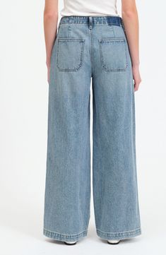 These '70s-inspired wide-leg palazzo jeans are remade for today from nonstretch denim in a casual-chic light wash. 32" inseam; 24" leg opening; 11" front rise Zip fly with button closure Front slant pockets; back patch pockets 70% cotton, 30% organic cotton Machine wash, dry flat Imported Trendy Light Wash Wide Leg Pants For Summer, Light Wash Wide Leg Cotton Flare Jeans, Summer Medium Wash Wide-leg Flare Jeans, Summer Light Wash Wide-leg Jeans, Trendy Medium Wash Wide Leg Pants For Spring, Trendy Wide Leg Medium Wash Pants For Spring, Spring Light Wash Wide-leg Flare Jeans, Trendy Spring Medium Wash Wide Leg Pants, Spring Wide Leg Flare Jeans In Denim Blue