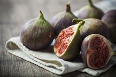 figs on a cloth with one cut in half