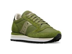 Saucony Originals Jazz Triple - Women's Shoes : Green : Stretch your legs and feet in the comfort of the Saucony Originals Jazz Triple sneaker. Textile and synthetic upper. Lace-up closure. Round-toe silhouette. Textile lining and insole. Synthetic outsole. Imported. Measurements: Weight: 10 oz Product measurements were taken using size 8.5, width B - Medium. Please note that measurements may vary by size. Green High-top Sneakers For Jogging, Green Lace-up High-top Sneakers For Jogging, Comfortable Low-top Green Walking Shoes, Green High-top Running Sneakers With Round Toe, Green Round Toe High-top Sneakers For Running, Sporty Green Slip-on High-top Sneakers, High-top Walking Shoes With Studded Rubber Outsoles For Sports, Jogging High-top Sneakers With Rubber Sole, Green Lace-up Walking Shoes With Boost Midsole