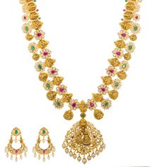 Our collection of 22k gold temple jewelry includes a beautiful selection of gold necklace and earring sets, like this gemstone encrusted pairing. The glimmering emeralds, rubies, pearls, and cz highlight the stunning depiction of Indian deities to create a look of Indian jewelry making excellence. This 22k gold and gemstone necklaces comes with matching gold chandbali earrings, making it the piece of Indian gold jewelry to adorn for cultural events and celebrations. Features • 22k yellow gold • Luxury Gold Cutdana Temple Necklace, Luxury Gold Bohemian Temple Necklace, Luxury Yellow Gold Chandbali Temple Necklace, Luxury Yellow Gold Temple Necklace For Celebration, Luxury Hallmarked Yellow Gold Temple Necklace, Luxury Yellow Gold Temple Necklace With Ruby, Gold Chandbali, Indian Deities, Necklace And Earring Sets