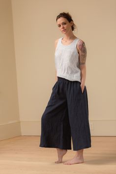 "DETAILS: - 100% linen pant - wide cropped legs - pockets - comfy wide elastic waist - mid-rise - waist is just below belly button LENGTH inseam is 23\" / 58cm from crotch point. MODEL is 5'3\" tall with B 32, W 28, H 35 wearing a size X-Small. Pictured above in mid-weight Midnight color. Select colors and sizes available Ready to Ship https://www.etsy.com/listing/983888219/small-batch-ready-to-ship-fog-culotte FABRIC: - The mid weight linen is 5.3oz / 150g. It is very soft and has a a nice line Wide Leg Ramie Bottoms With Pockets, Effortless Relaxed Fit Linen Wide Leg Pants, Relaxed Wide Leg Linen Bottoms, Versatile Linen Wide-leg Pants, Summer Linen Wide Leg Pants For Everyday, Wide Leg Flax Bottoms With Pockets, Summer Wide Leg Pants With Pockets For Everyday, Relaxed Linen Bottoms With Pockets, Relaxed Fit Flax Linen Wide Leg Pants