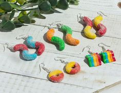 These Sour Candy Earrings are handmade with polymer clay and comes on a stainless steel fishhook and  silicone backing.   Each purchase will only come with one set of earrings. Since all items are made by hand, slight variations, imperfections, and difference may occur.   Store items in a clean and dry area. Do not wear in the water. Earrings are delicate so store carefully so they will not bend or scratch.   Any questions, please feel free to message me! Rainbow Belts, Sour Candy, Fish Hook, Clay Jewelry, Amazing Jewelry, Polymer Clay, Jewelry Earrings Dangle, Dangle Drop Earrings, Candy