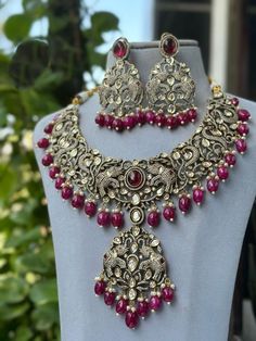 Kundanjewelsbyshiv Indian Ethnic Polki Kundan 22 Carat Gold Plated Pink And Purple Necklace Set * This Set Is made up with High Quality Uncut Polki Kundan *  Gold Plating Is used * High Quality Beads Are used * Set includes  Necklace and earrings Beads Color  (Pink and Purple Color) Can be customized according to your requirements. We made Jewelry in pachi kundan /Ahemdabadi kundan and made designs on order only , need at least 25 days to make ,to do customization as they are acceptable. jewellery details :All jewellery are made with silver base and luxury gold plated next to real,generally we work on direct made on order.   We are  the dealers of Authentic and traditional Indian Jewelry  We  are honored to present you our elegant, stylish and unique designs with a  wide range of items in Purple Necklace Set, Indian Bridal Necklace, Elephant Shape, Traditional Indian Jewellery, Gold Bridal Jewellery Sets, Jewelry Roll, Indian Necklace, Indian Jewelry Sets, Kundan Necklace