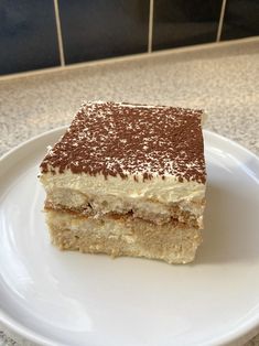 a piece of cake sitting on top of a white plate