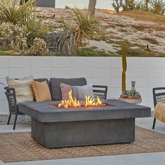 a fire pit sitting on top of a patio