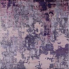 an abstract rug with purple and pink colors