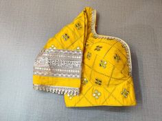 Add yellow embroidered designer saree blouse with mirror work and lace border with sweetheart neckline. Buy readymade saree blouse in USA from Pure Elegance.. Disclaimer: The actual product may vary slightly from the image. These are custom orders, hence expect slight variation in color, placement of the motif or buta. ESTIMATED DELIVERYBecause this is a custom order, it would take about 2 weeks from the date of purchase. RETURN POLICY: This product is a custom order and cannot be returned or exchanged. Blouse With Mirror Work, Sweetheart Neckline Long Sleeve, Banarasi Sari, Designer Saree Blouse, Blouse Sari, Saree Blouses Online, Readymade Saree, Pure Elegance, Bangle Ring