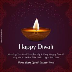 a happy diwali card with a lit candle in the middle on a purple background