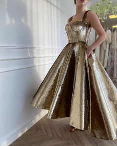 Details: -Designer sequined fabric -Gold color -Tea length style with boning structure Scotland Style, Beautiful Gown Designs, Teuta Matoshi, Tea Length Dress, Valley Girl, Gold Bridesmaid Dresses, Effortlessly Chic Outfits, Princess Ball Gowns, Dress Sleeve Styles