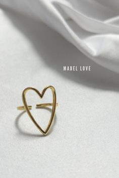 Heart Adjustable Ring It's a timeless addition to any collection, crafted with the finest materials and expert craftsmanship for superior quality. Adjustable Gold Ring, Love And Co, Girl Gang, Adjustable Ring, Adjustable Rings, Gold Ring, Heart Ring, Gold Rings, Ring