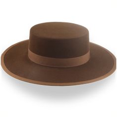 Description Materials Craftsmanship Hat Care Shipping Returns Product Description A Stylish Brown Flat Crown Cowboy Hat Step into the spirit of the West with the Gaucho, a brown flat crown cowboy hat handcrafted from premium rabbit fur felt. Featuring a 3 3/4" crown and a 3 5/8" steel-wired brim, this hat offers the perfect balance of rugged style and functionality. Custom-made for a perfect fit, the Gaucho ensures both comfort and durability. The smooth finish and grosgrain ribbon hatband add a Crown Cowboy Hat, Gaucho Hat, Homburg, Chapeau Cowboy, Big Hat, Brown Flats, Hat Box, Cow Boy, Felt Hat