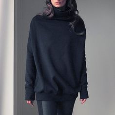 A thick sweatshirt with an original cut. Narrow at the back, wider at the front and rib at the bottom. Long sleeves. The name comes from the shape of the sweatshirt, which reminds Buka from the Moomin Valley. All edges sewn. One size is universal. Oversize. Soft blouse 95% cotton, 5% elastane. A soft nap from the left. One size, length (more or less from the shoulder): approx. 75 cm, armpit width: approx. 61 cm. Wash at low temperature, iron on the lowest program. Note: the product is made after Oversize Turtleneck, Sweat Noir, Unique Sweatshirt, Slouchy Sweater, Oversized Turtleneck, Turtleneck Sweatshirt, Off Shoulder Sweater, Black Sweatshirt, Pink Sweatshirt