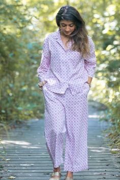 There is a lot to love about these chequered pyjama set,if you are fan of Japanese design then these pjs will not disappoint you! Made with the softest organic cotton. The arm and leg length is shorter than more conventional pjs but they look fabulous and quirky. The top has a boxy body with 3/4 wider sleeves and trousers are cropped slightly above the ankle length. Organic cotton is so soft and is known for its breathable and lightweight quality keeps you cool in summer and toasty in winter Features  - Pure soft cotton  - Vegan product  - Lightweight and breathable  - Elastic waist with drawstring  - Button closure  - Straight full length trousers  - Gorgeous print available in two colours  - Generously sized for comfort  - Washes and dries quickly  - Ethically made in India - Machine was Comfortable Relaxed Fit Pajama Party Sets, Cotton Sleep Sets With Long Pants, Comfortable Matching Sleepwear Set For Spring, Comfortable Matching Set Sleepwear For Spring, Cotton Matching Set Sleepwear For Pajama Party, Cotton Sleepwear Long Pants For Spring, Pink Cotton Relaxed Fit Sets, Pink Cotton Sets With Relaxed Fit, Pink Relaxed Fit Cotton Set