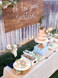 a table with cake and desserts on it that says, oh how sweet sixteen