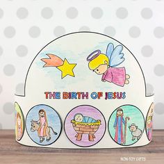 the birth of jesus is depicted in this handmade paper crown with pictures of baby jesus