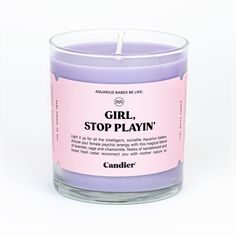 a candle that is sitting in front of a white background with the words, sis stop stressin'on it