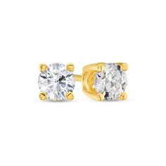 Build your collection of everyday essential styles with these 1/3 ct. t.w. round diamond solitaire stud earrings, a dainty choice for every look and occasion. Crafted in warm 10K gold Each earring showcases a shimmering 1/6 ct. round diamond solitaire in a classic four-prong setting. Radiant with 1/3 ct. t.w. of diamonds These post earrings secure comfortably with friction backs. Classic Round Diamond Earrings For Everyday, Classic Everyday Round Diamond Earrings, Solitaire Studs, Diamond Stone, Earring Backs, 10k Gold, Diamond Solitaire, Stone Settings, Designer Earrings