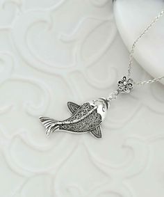 Introducing our handcrafted filigree art fish figured women's silver pendant necklace, a unique piece of jewelry that you'll love to wear or give as a gift. The pendant is made from high-quality silver and features a beautifully detailed fish figure that's sure to catch everyone's eye. The pendant measures 1.70 inches in height and 0.80 inches in width, and it comes with a silver chain that's 20 inches long, making it the perfect length for layering with other necklaces or wearing on its own. Yo Sterling Silver Fish-shaped Jewelry, Sterling Silver Fish-shaped Jewelry Gift, Sterling Silver Fish-shaped Jewelry As Gift, Antique Silver Pendant Necklace With Lobster Clasp, Fish-shaped Charms Necklace Gift, Handmade Fish-shaped Jewelry Gift, Handmade Sterling Silver Fish-shaped Jewelry, Handmade Silver Fish-shaped Necklace, Handmade Sterling Silver Fish Jewelry