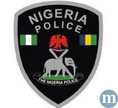 the police badge is shown in black and green, with an elephant on it's back